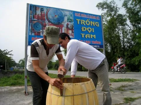 Artisan makes drum Stock Photos