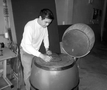 Artisan makes drum Stock Photos