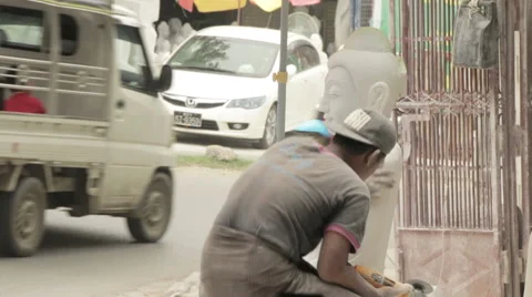 Artisan Making a Buddhist Statue in Workshop in Mandalay Burma (Myanmar) Video stock 65879825