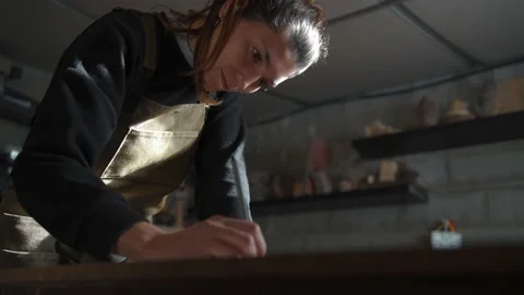 Artisan making sketch in workshop Stock Footage 167422902