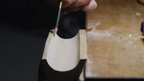 Artisan marks a poplar tea leaf holder with a simple pencil.handmade concept Видео 147872138