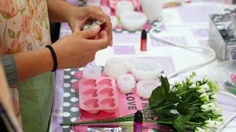 Artisan opening candle making toolkit at workshop Stock Footage 334553835