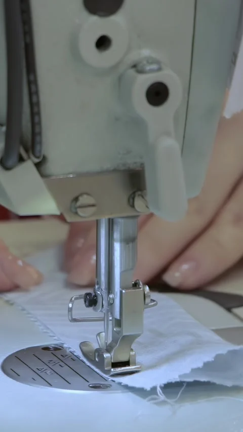Artisan Precision Crafting Garments on Advanced Automated Machinery 스톡 동영상 344618273