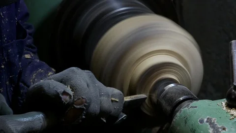 Artisan redefining wood on lathe Stock Footage 94712853