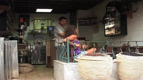 Artisan Roaster Talking With Client in Egyptian Shop Stock Footage 285835867
