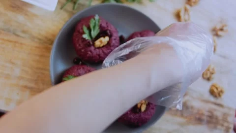 Artisan serving detail: capturing walnut and beet texture Stock Footage 342200449