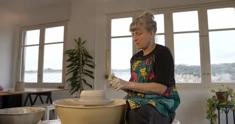 Artisan shaping clay: Stock Footage 329303662