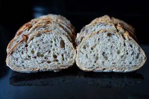 Artisan Sliced Bread on Dark Background Stock Photos
