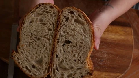Artisan Sourdough Bread in Hand. Stock Footage 308233270