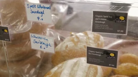 Artisan Sourdough Bread Loaves on Display at Sydney Market Bakery Stall Stock Footage 345801379