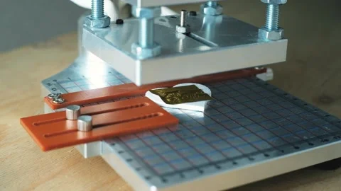 The artisan stamped the logo. Side view is macro. Handmade leather goods. Stock Footage 158037577