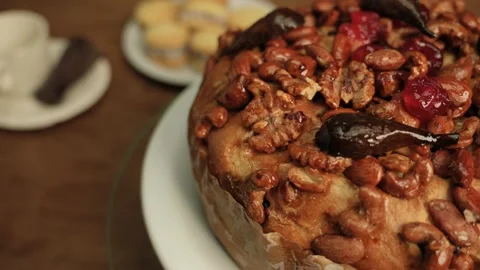 Artisan sweet bread with nuts and berries. New Year's cake. Sweet cake Vídeo Stock 313800201