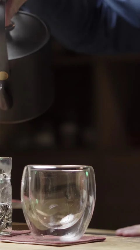 The Artisan Tea Brewing Process Involves Using Fresh, Quality Ingredients for Stock Footage 306049881