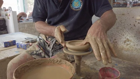 Artisan work with clay creating an ashtray. Greece, Sifnos. Stock Footage 125784308