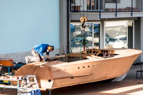 Artisan at work in the construction of boat 写真素材