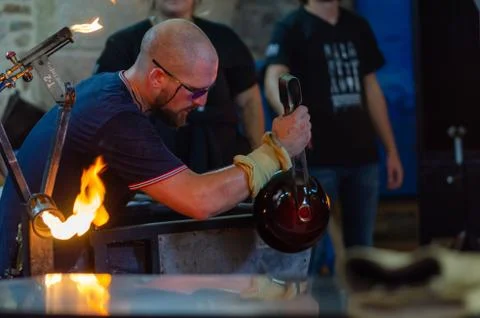 Artisan working with fire Stock Photos