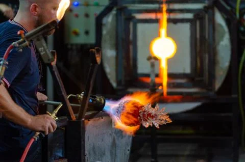 Artisan working with fire Stock Photos