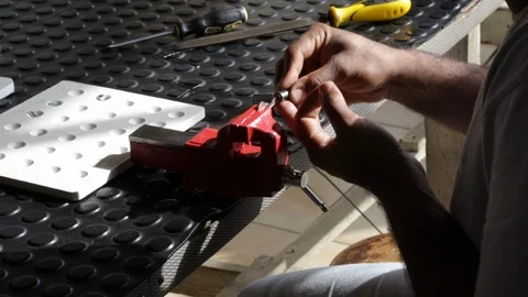 Artisan working on a key (take 2) Video stock 88419024