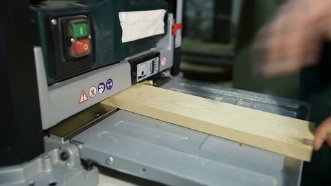 Artisan working with planing machine in workshop Video stock 73412765