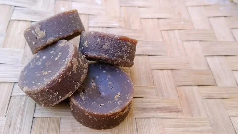 Artisanal Brown Sugar Blocks on Handmade Bamboo Mat Setting Video stock 341456213