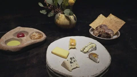 Artisanal Cheese Platter with Condiments and Bread 스톡 동영상 314346992