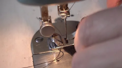 Artisanal Fabric Preparation and Sewing Machine Mastery Vídeos de archivo 248075053
