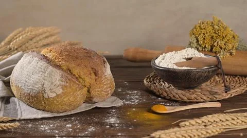 Artisanal Loaf of Bread with Baking Ingredients Stock Photos