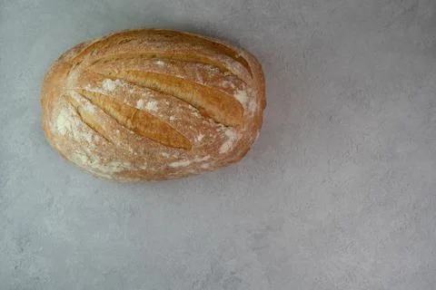 Artisanal White Rustic Bread: A Crusty Oval Loaf Stock Photos