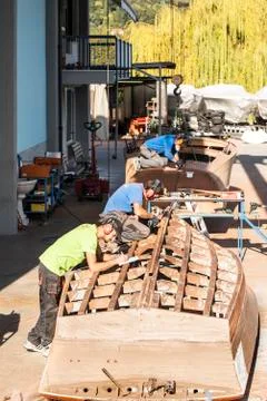 Artisans at work in the construction of boats Stock Photos
