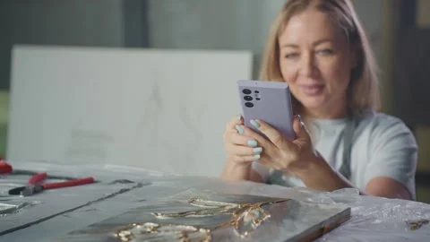 Artist Checking Work on Phone Stock Footage 281618266