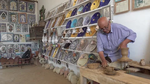 Artist creates ceramic pottery in workshop Guellala, tradition culture Tunisia Stock Footage 334380651