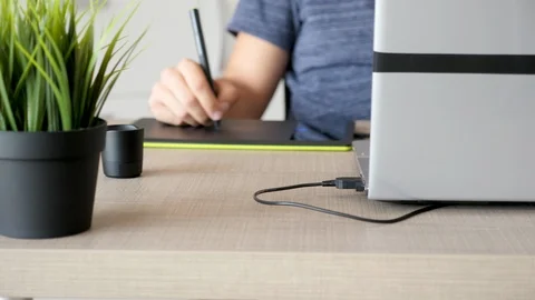 Artist drawing on digital tablet Stock Footage 93336349