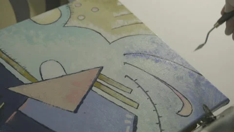 Artist draws abstraction in a workshop Stock-Footage 141678490