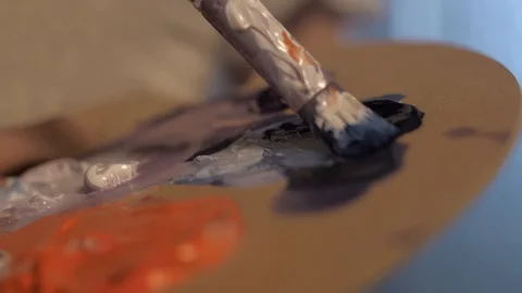 The artist draws with brush. Stock Footage 128115151