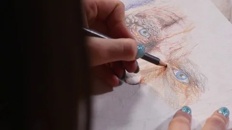 The artist draws with colored pencils Stock Footage