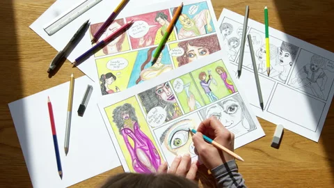 The artist draws comic book characters on paper. Video stock 172495875