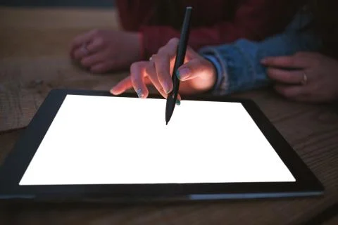 Artist draws on an empty graphic tablet, closeup Stock Photos