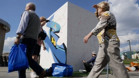 The artist draws on a large cube Stock Footage 126370116