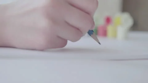 The artist draws with a pencil Stock Footage 132254591