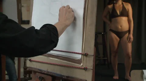 ARTIST DRAWS SKETCHES LIVE BIKINI WOMAN FEMALE MODEL HD 1080 Stock Footage