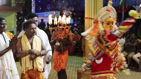 An artist guiding devotees while performing dance Stock Footage 208381628
