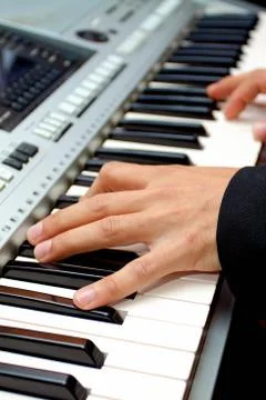 Artist hands of a piano player Stock Photos
