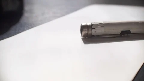 The artist inserts the pen in calligraph. Close-up video Video stock 74788057