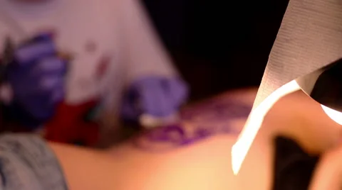 Artist makes a tattoo Stock Footage 64517166