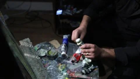 The artist opens the paint can 1 Stock Footage 327026055