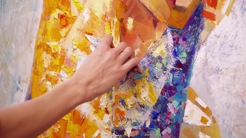 An artist paining on the canvas Stock Footage 74720224