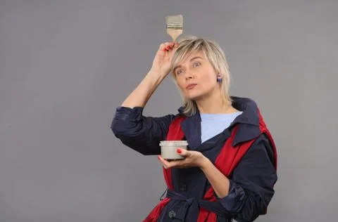 Artist painter on gray background Stock Photos
