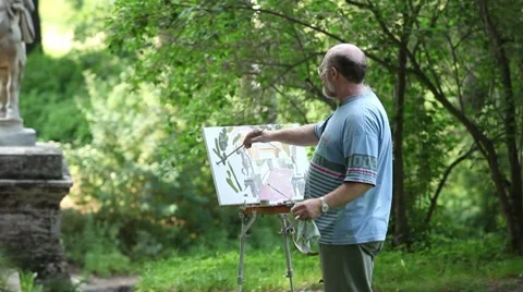 Artist painting watercolor Stock Footage