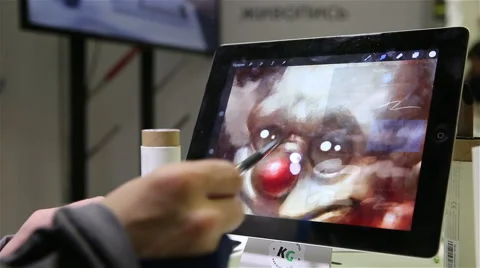 Artist paints with a brush in the tablet, using technology of digital painting. Stock Footage 48596231