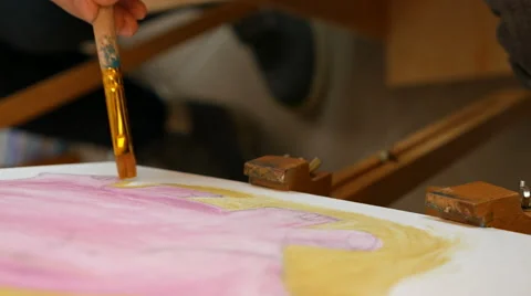 Artist paints picture artwork canvas in art studio Stock Footage 59657359